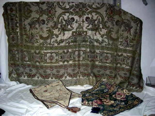 TABLE LINENS: Italian Tablecloth, w/Metallic Look, Floral Swags, Cherubs and Scalloped Edge, 70" x 90"; Linen Table Runner with Embroidery and Tassels; and Two Floral Tapestry Table Runners, One w/Tassels.