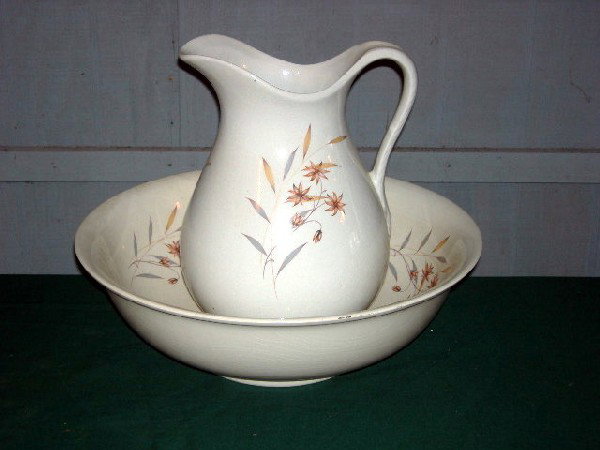 IRONSTONE PITCHER AND BOWL: White Washstand Pitcher and Bowl Decorated w/Flowers and Leaves in Gray, Gold and Rust, Royal Crownford, Staffordshire England, 15.5" Bowl Diameter and 11.75" Pitcher Height.