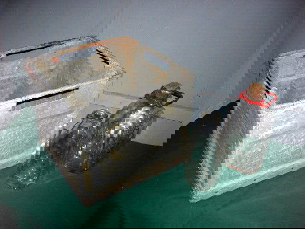 METAL MILK CRATE W/MILK BOTTLES: Sectioned Metal Milk Crate Marked Forest Hills Memphis and Milk Bottle Marked 1/2 Gallon, Milk Bottle Marked 1 Qt Duraglas Milk Bottle.