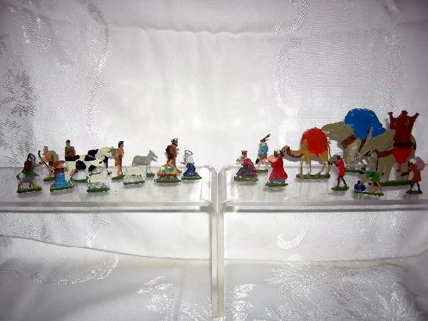 MINIATURE PAINTED METAL NATIVITY FIGURES: 22 Miniature Painted (Pewter?) Nativity Figures, Made in Germany, Ranging in Sizes From .75" Tall to 3.25" Tall, Marked H/H, Including Holy Family, Shepherds, Wise Men, Workers & Animals.