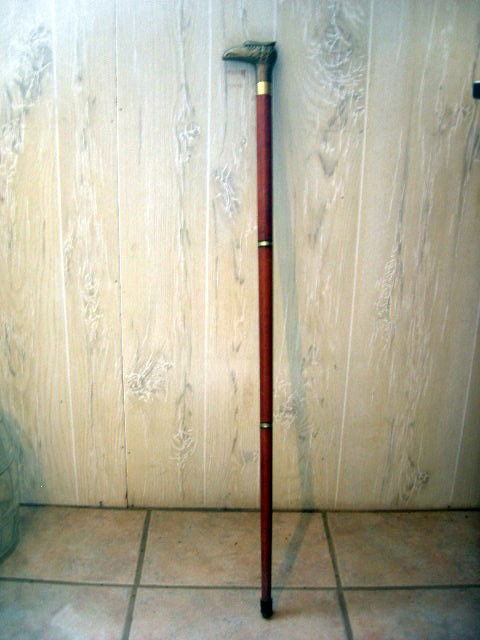 BRASS & WOOD FALCON HEAD CANE: Brass Falcon Head 4-Piece Wooden Walking Stick, 35.25" Tall.