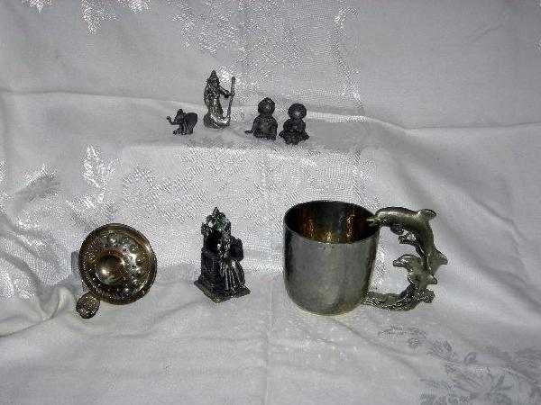 METAL LOT INCLUDING PEWTER: Metal Lot Including Pewter Raggedy Ann & Andy Figures, Pewter 1987 Merlin Figure, Fantasy & Legend King Arthur UK, Chateau de Meursault Wine Taster, Mini-Elephant, and Ballena Bay Pewter Mug w/Dolphin