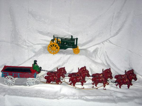 PAINTED CAST IRON TOY LOT: Lot Including John Deere Tractor, 8" Long; Wagon w/8-Horse Team, 2 Drivers, 31" Long.