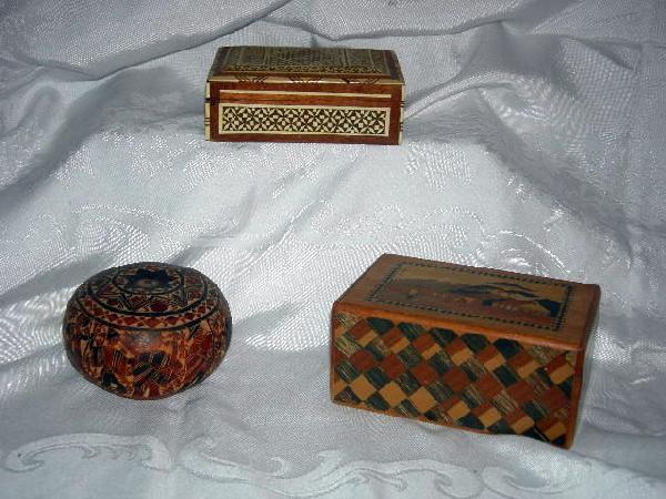TRIO MINIATURE DECORATIVE BOXES: Three Miniature Decorative Boxes Including Inlaid Mother of Pearl & Wood, 5.5" Long; Hand Carved Gourd Marked Peru, 4.5" Diameter; Puzzle Box w/Inlaid Wood, 6" Long.