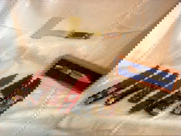 KNIFE & HATCHET LOT: Lot Includes 7 Knives and a Hatchet. Bone Handled Knife in Sheath (Some Corrosion) 10.25" Long, Western Bolder Co Made in USA in Decorated Leather Sheath (Well Worn) 9.25" Long, Schrade Old Timer USA