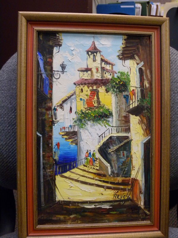 REYES SEASIDE OIL ON CANVAS: Oil painting of seaside village, 3-dimensional effect, signed lower right, image 15.25" tall x 9.25" wide, framed 18.25" tall x 12.25" wide.