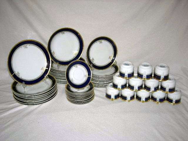 CZECHOSLOVAKIAN CHINA: Sabina "Loucky" Czechoslovakian China, Blue & White w/Gold Trim Inc. 8 Dinner Plates, 12 Soup Bowls, 12 Salad Plates , 12 Cups, & 11 Saucers.
