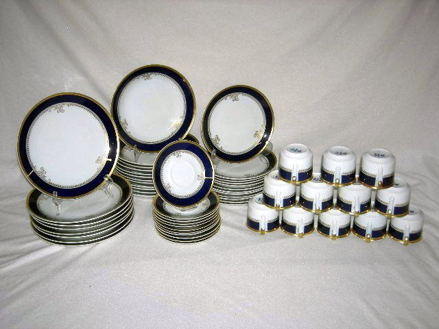 CZECHOSLOVAKIAN CHINA: Sabina "Loucky" Czechoslovakian China, Blue & White w/Gold Trim Inc. 8 Dinner Plates, 12 Soup Bowls, 12 Salad Plates , 12 Cups, & 11 Saucers.
