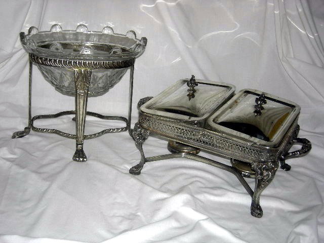 SILVER LOT: Silver Tone Buffet Stand, Oval, 4 Legs Ending in Paw Feet, 9" Tall; Silver Plate Double Chaffing Dish, Ornate Handles and Finials, 2 Covered Burners, Two 1 Qt. Pyrex Dishes, 15" Wide x 8.75" Tall.