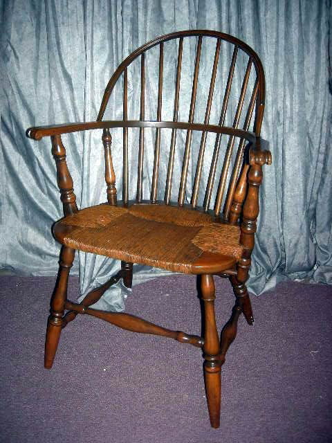WINDSOR ARM CHAIR: Windsor Arm Chair, Appears To Be Walnut w/Rush Seat, Turned Stretchers, Arm Support Stretcher, 37.5" Center Back.