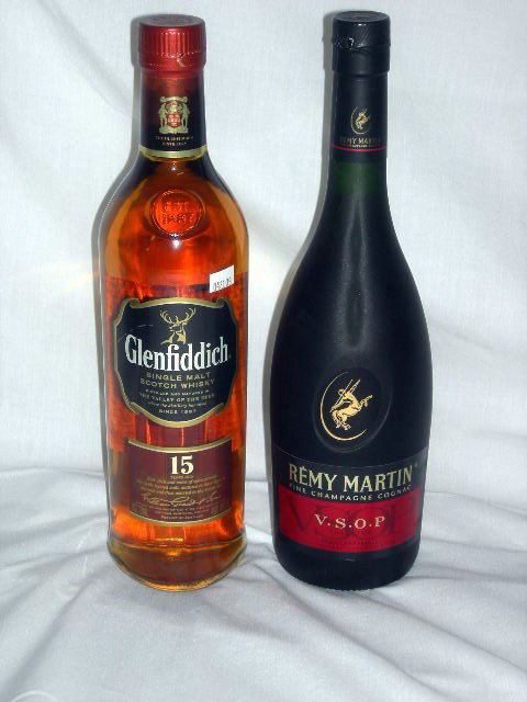 Liquor Lot: Two Bottle Liquor Lot Including 15 Year Old Glenfiddich Single Malt Scotch Whisky (Scotland) and Rémy Martin Fine Champagne Cognac V.S.O.P. (France).