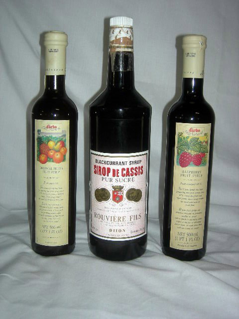 Trio Of Fruit Syrups: Syrups Including Blackcurrant Syrup Sirop de Cassis Pur Sucre, Rouviére Fils Product of France; d'arbo All Natural Raspberry Fruit Syrup (Austria) and d'arbo Tropical Fruits Fruit Syrup (Austria).