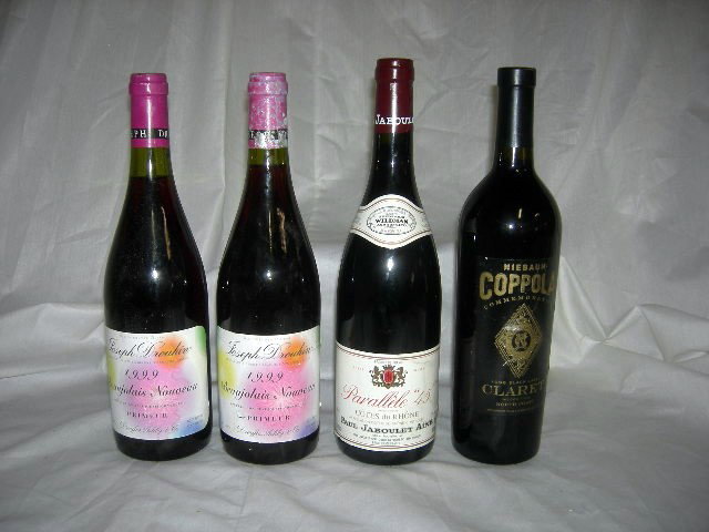 Four Bottle Lot Red Wines: Lot Includes Two 1999 Joseph Drouhin Beaujolais Nouveau, One Parallèle 45 Cotes du Rhone 1998, One Niebaum Coppola (Francis F. Coppola Proprietor) 1996 Black label Claret (Medoc Type).