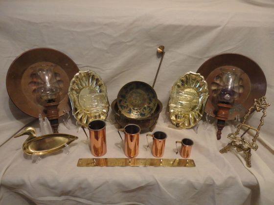 BRASS & COPPER LOT: Brass & Copper Lot Including 2 Pairs Candle Holder Wall Hangings, 12" T & 8.5" T; Jerusalem Bowl, 6" D; Footed Bowl, 8.5" D; Easel, 9" T; Duck, 7" L; Candle Snuffer; Rack w/Measuring Cups, 2.25" T –