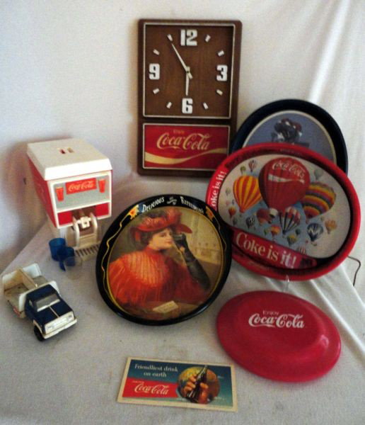 COKE ADVERTISING LOT: Coke Advertising Lot Inc. "Enjoy Coca-Cola" Clock, 3 Oval Trays, Frisbee, Child's Toy Icee Machine, Tonka Delivery Truck and Drink Coca-Cola "Friendliest Drink On Earth" Card Copy Right 1956, 3" to 17