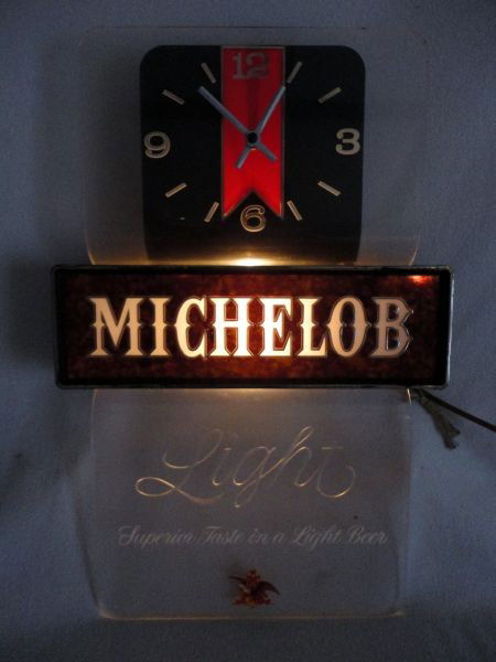 "MICHELOB LIGHT" ADVERTISING CLOCK: "Michelob Light" Electric, Illuminated Advertising Clock, 11.5"W X 18"T.