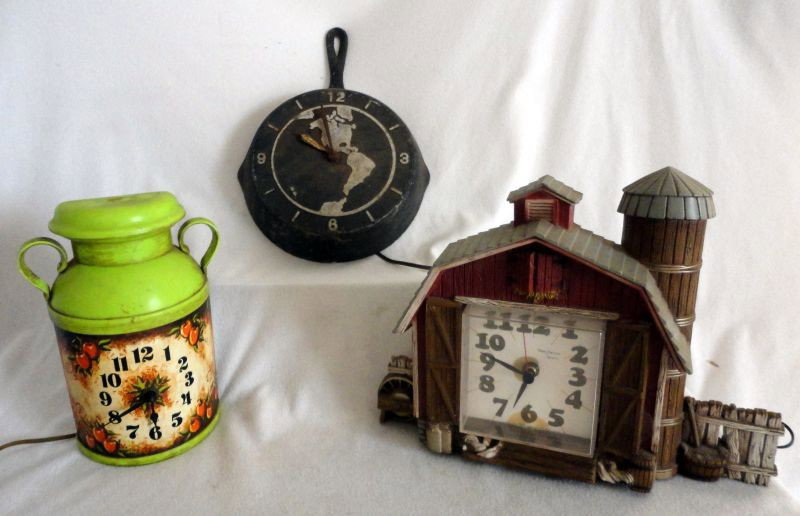COUNTRY KITCHEN CLOCK LOT: Country Kitchen Electric Clock Lot Featuring Cast Skillet Look Pan w/North American Map Clock Face, Lime Green Milk Can & Barn w/Silo Battery Operated (w/1 C Battery) Clock, 10" TO 13"T.