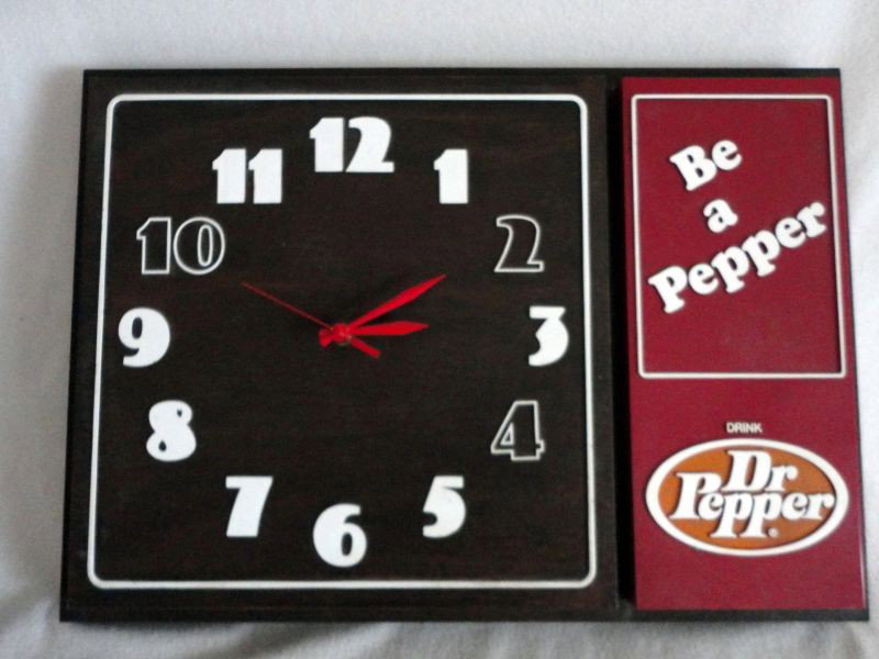 DR.PEPPER BATTERY OPERATED ADVERTISING CLOCK: "Be A Pepper Drink Dr. Pepper" Wood Grain Clock Requires 1 AA Battery,18.5"W X 13"T.
