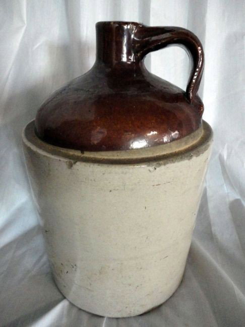 LARGE CROCK JUG: Large Crock Jug, Sand w/Brown Top & Applied Handle, 8.75"D X 13"T.