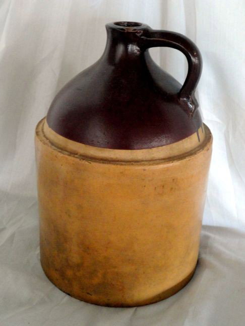 LARGE CROCK JUG W/BROWN TOP: Large Crock Jug, Sand w/Brown Top & Applied Handle, 9"D X 13"T.