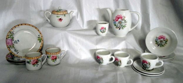 NIPPON /JAPAN MARK CHILD'S TEA SETS: Porcelain Handpainted Nippon (Blue Mark) Child's Tea Set Includes Covered Teapot, (3" T), Two Cups, and Three Plates (4.5" D); Ceramic Made in Japan Child's Tea Set Includes Coffee Pot (4" T), Sugar B