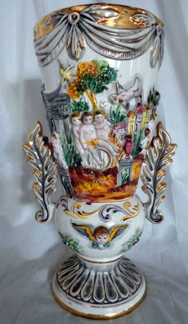 CHERUB DECORATED PORTUGUESE VASE: Large Capodimonte Style Vase w/Cherubs, Garlands, Bearded Figure and Feather Handles, Marked Pereigras Valado Portugal August 1933, 6.5" D x 14.25" T.