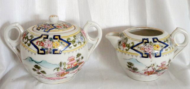 NIPPON COVERED SUGAR & CREAMER: Porcelain Handpainted Nippon Covered Sugar and Creamer Marked Made in Nippon.