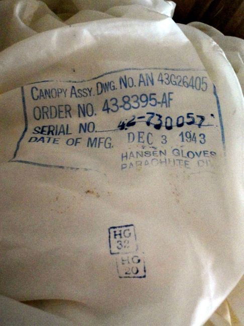 WWII PARACHUTE: Hansen Gloves Parachute Division WWII Silk Parachute w/Blue Printed Tag Dated Dec. 3, 1944 and some blue numbers and Letters.