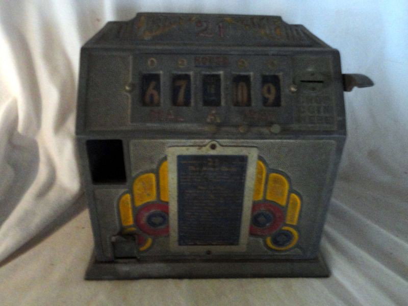 ARMY 21 SLOT MACHINE: Slot Machine w/Playing Directions on Front, Cast, 11" W x 8.5" D x 11" T.