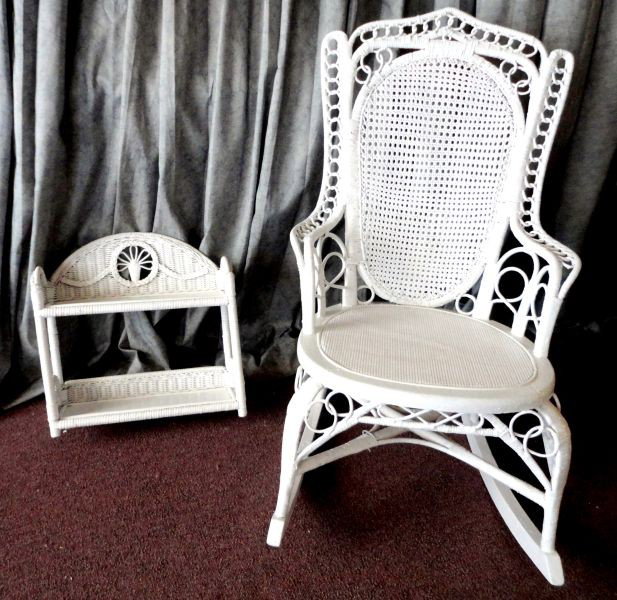 LADIES WHITE WICKER ROCKING CHAIR W/SHELF: Vintage Diminutive White Wicker Rocker, 35.5" T; and White Wicker Shelf, 17.5" W x 16.5" T.