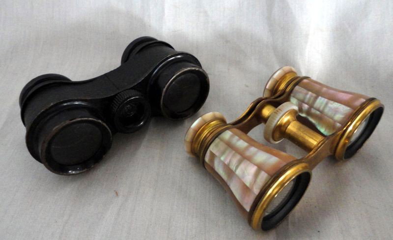 OPERA GLASSES: Two Pair of Opera Glasses Including Black Man's Marked Trojan Made in USA and Mother of Pearl Lady's Marked Lemaire Paris and Inez Long.