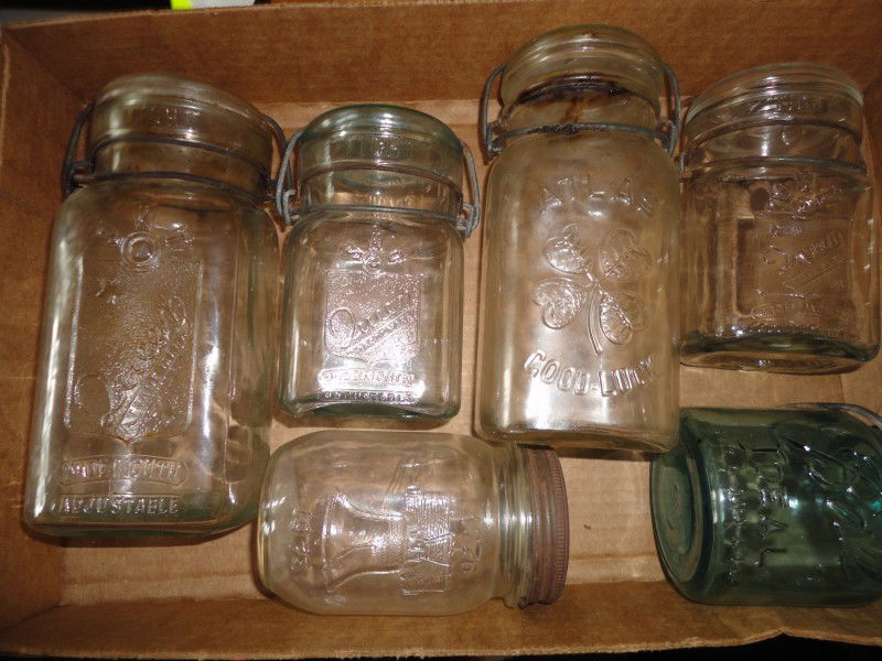 CANNING JAR LOT: Lot Includes Six Jars Including Three Queen Trade Mark Wide Mouth Adjustable SKO Jars in Two Sizes, 7.5" & 5.5" T; an Atlas Good Luck, 7.5" T; a Green Ball Ideal Pat. 1988 and a Centennial Mason Pint