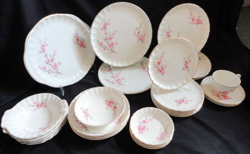 WS GEORGE DINNERWARE: 27 Pieces WS George Bolero Dinnerware Including 1 Oval 12" L Platter, 2 Dinner Plates, 3 Luncheon Plates, 6 Salad Plates, 3 Soup Bowls, 1 Cereal Bowl, 3 Berry Bowls, 3 Saucers, 1 Cup, 2 Small Tab Hand