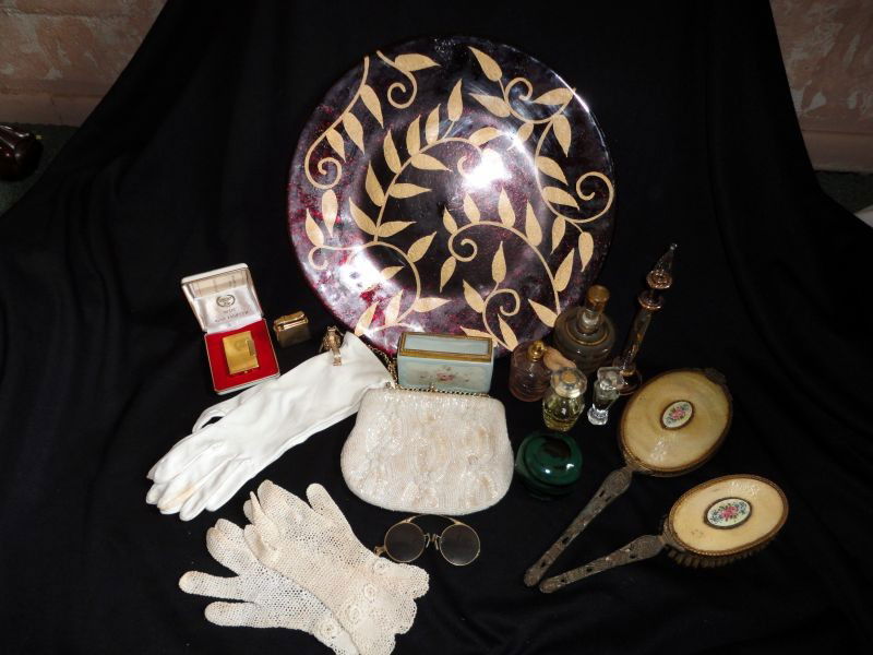 VINTAGE LADIES LOT: Lot Includes 2 Vintage Lighters (Win Electronic and Kreisler); Brush and Beveled Hand Mirror; Beaded Purse (Staining) w/Glove Holder; 2 Pairs of Gloves, Various Perfume Bottles, Spectacles, Green Pape