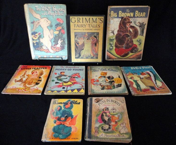 VINTAGE CHILDRENS BOOKS: 9 Books, Including Puss in Boots "A Peep Show Book," 4 Little Golden Books ("The Little Trapper" Copywrite 1950; "The Marvelous Mary-Go-Round" Copywrite 1950, Marked A; "Three Little Kittens" Copywrit