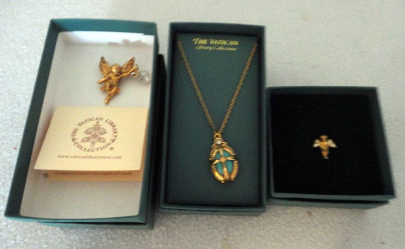 VATICAN LIBRARY COLLECTION JEWELRY: 20" Enamel Turquoise Oval Pendant, Host of Angels Gold Cherub Brooch W/Pewter Starburst, Gold Tone & Crystal Angel Lapel Pin.