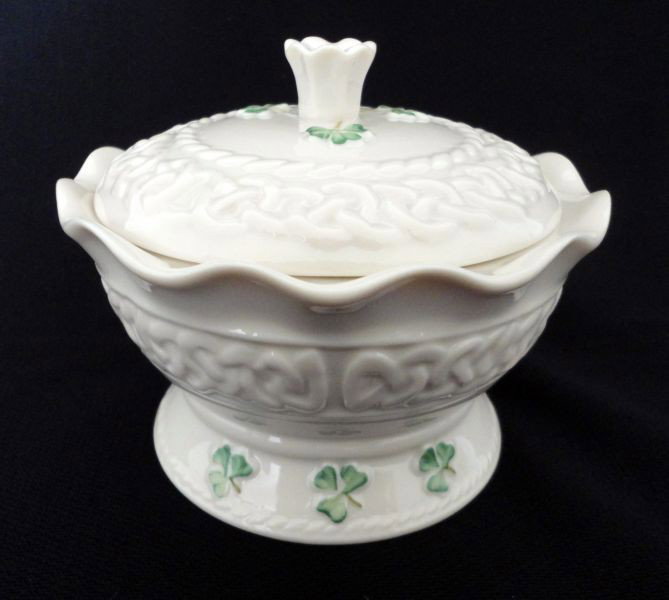BELEEK COVERED BOX: Covered Box "Tara," Ruffle Rim, Braided Design W/Green Shamrocks, Daisy Knob on Cover, stamped Belleek, Hand Painted, Fine Parian China, Hand Crafted In Ireland, 5"D x 4"T.