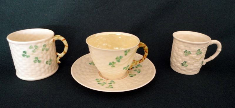 FOUR PIECE BELLEEK LOT: Including: 2 Mugs and Cup w/Saucer; All Pieces are Stamped, Hand Painted, Fine Parian China, Hand Crafted In Ireland, Mugs 2.5"T & 2.25"T, Cup 2.5"T Saucer 5.75"D.