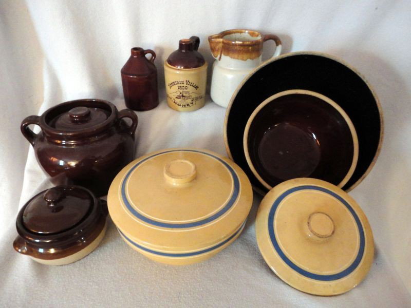 KITCHEN STONEWARE LOT: Lot Includes Covered Beige Bowl w/Blue Stripe, Odd Beige Lid w/Blue Stripe, Two Brown Bowls (8" - 11" D), McCoy Pitcher (6" T), Two Jugs, Covered Bean Pot, Covered Soup Bowl.