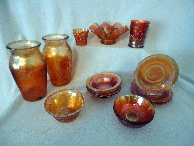 MARIGOLD CARNIVAL GLASS LOT: 15 Piece Marigold Iridescent Carnival Glass Includes Ruffled Edge Bowl w/Floral Center, 7" D; 2 Textured Vases, 7.5" T; One Basket Weave Bowl, 4.5" D; Lotus Flower Glass, 4" T; Toothpick Holder, 2.5" 