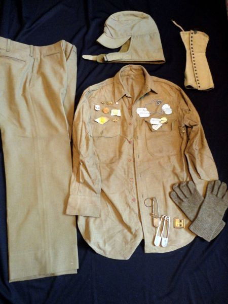 MILITARY UNIFORM PLUS: Including: Olive Drab Pants, Shirt w/Badge (Oval Gold w/Eagle 1 Wing Spread Under & 1 Over Circle), Hat Rite Style Model Dated 10/15/1940, Stock No. 55-C-64294, Boot Guard Canvas Legging, Pair Wool Gl