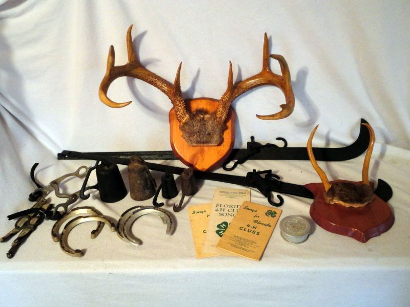 VINTAGE COTTON SCALES PLUS: 2 Cast Iron Cotton Scales w/4 Weights, 2 Marked 4 lbs, 4 Horse Shoes, 2 Mounted Horns,Horse Bit & Hammer. With Aluminum Girl Scout Collapsible Cup and 3 4-H Club Song Booklets.