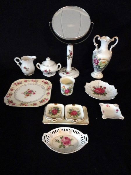 ROSE DECORATED CERAMIC LOT: 13 Piece Lot Includes Smoking Set of Cigarette Cup Holder, 4 Individual Ashtrays on 6.25" L Tray; Japan Goldcastle Plate, 7" Square; Japanese Arnart Urn Vase, 8.5" T; Creamer & Covered Sugar; Single I