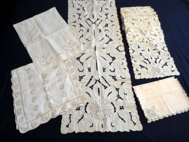 EMBROIDERED PLACEMATS, RUNNER & DRESSER SCARVES: Lot on Beige Linen w/Taupe Accent Includes 8 Placemats & Table Runner (16"W x 40.5" L) in Cut Embroidery Work and Two Dresser Scarves (14.5" W x 30.5" L and 13.5" W x 39.5" L.