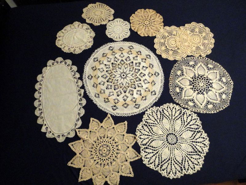 11 CROCHETED DOILIES: Pieces from 7.5" D to 20.5" D (Two Tone). One Pair in Ecru.