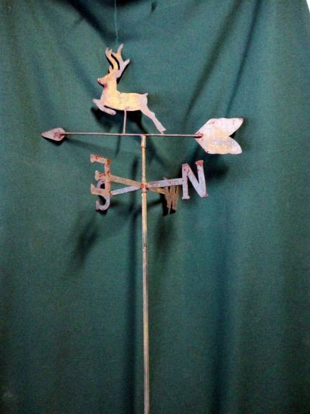 LEAPING STAG WEATHER VANE: Rustic Weather Vane Mounted to Pole, Includes Stag on Arrow & Letters N, S, E, W; Deer is Painted White on One Side, 77.25"T.