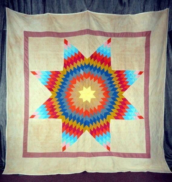 LONE STAR QUILT: Hand Sewn Brightly Colored Lone Star Quilt w/Pink Border On Cream Background, 74"W X 76"L.