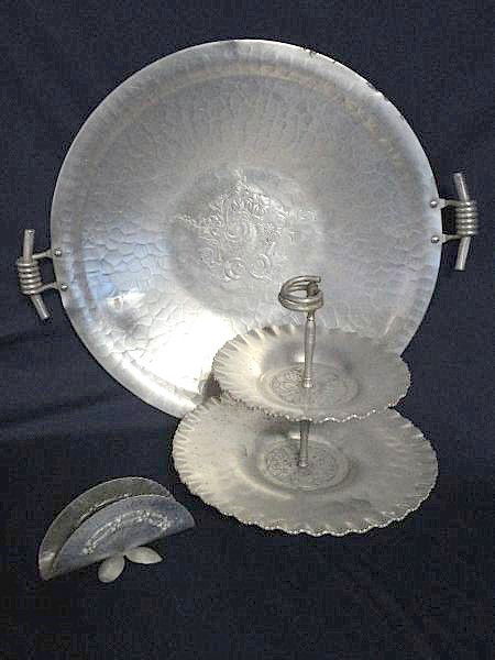 HAND FORGED ALUMINUM LOT: 3 Piece Lot Inc. Round Serving Tray w/Floral Bouquet Center, Applied Rope Style Handles, Stamped "Hand Forged," 18"D; 2 Tier Tidbit/Desert Tray w/Berry & Fruit Center, Ruffled Rim, Rope Handle, 10"T;