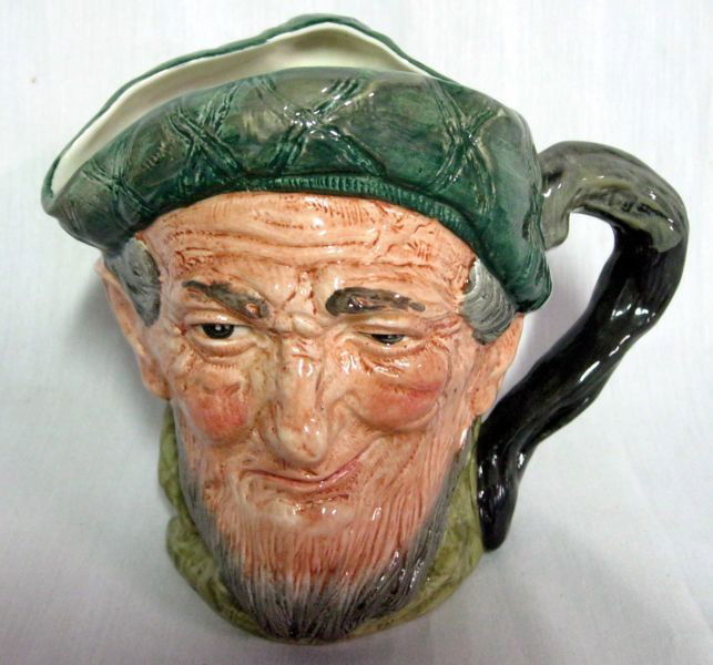 ROYAL DOULTON TOBY JUG: “Auld Mac” Toby Jug Character, Marked # D 5823, 8”W X 6.25”T.
