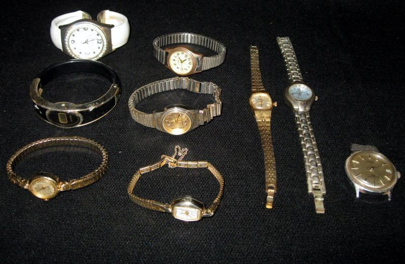 WATCH LOT: Lot Inc. 9 Watches, Men's Two Milan: One Silver w/Blue Face, One Gold; M.Z. Berger; Gold Pulsar; Geneva Platinum; & Black Quartz.